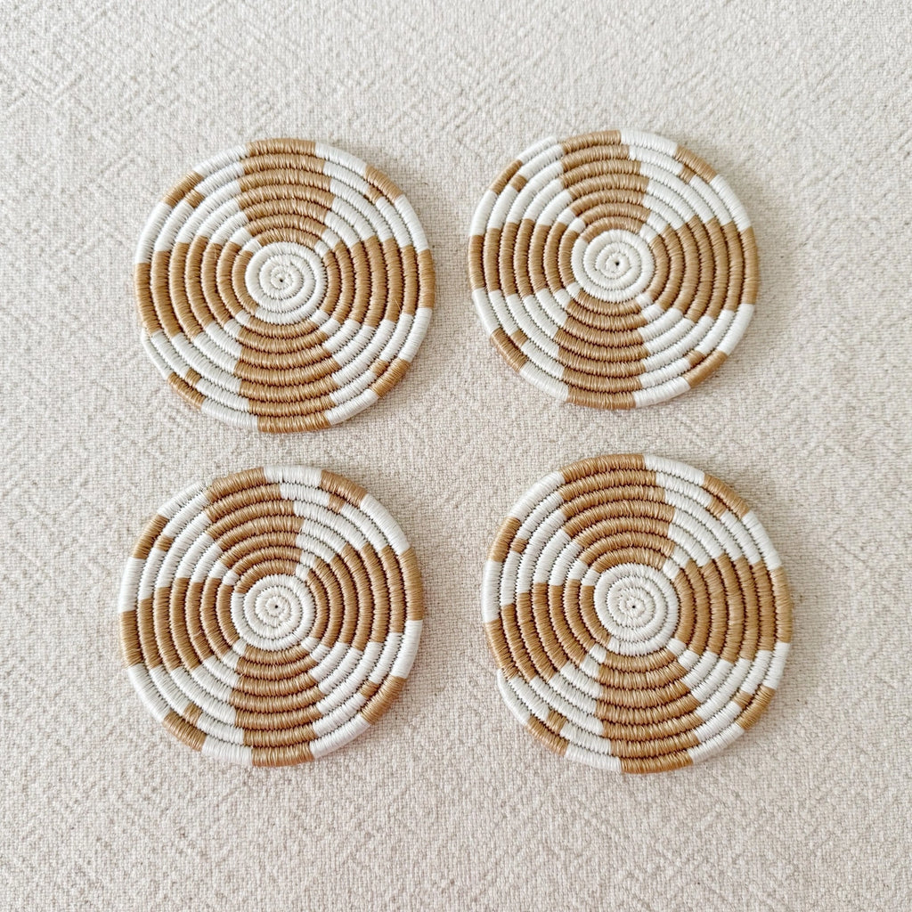 Mahjong Table Protection Coaster Set Handwoven Sisal Natural Fiber Circle Design Artisan Crafted Rwanda Female Weavers Tan White Spiral Pattern Four Inch Diameter Game Night Essential Beverage Protection Surface Care Handmade Quality Set Of