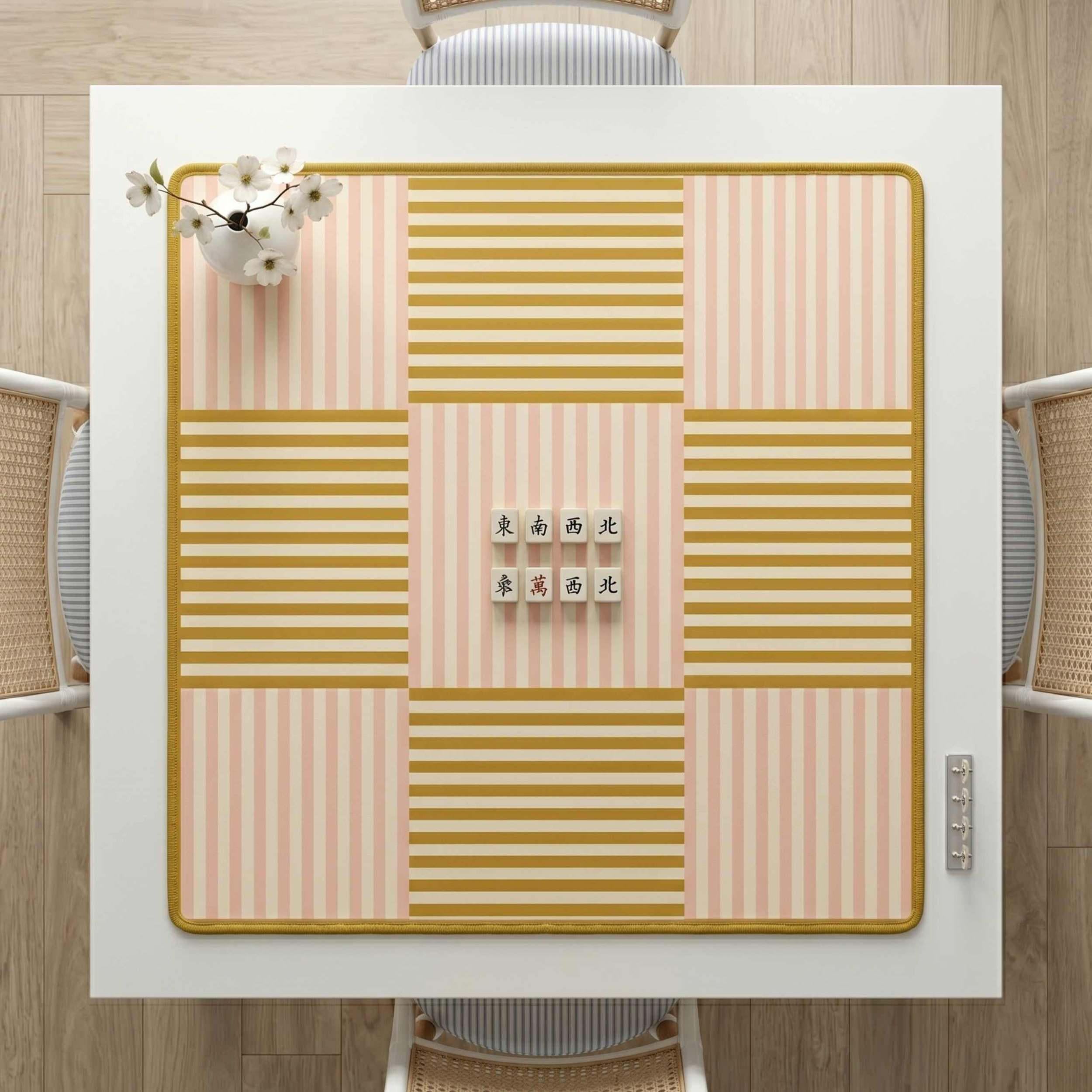 The Dunmore Weave mahjong mat, 33x33 inch, pink and gold color block geometric pattern, non-slip neoprene